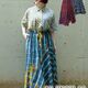 ＜AS KNOW AS olaca /‎アズ・ノゥ・アズ・オオラカ＞刺繍を施したチェック柄アシメトリースカートです。